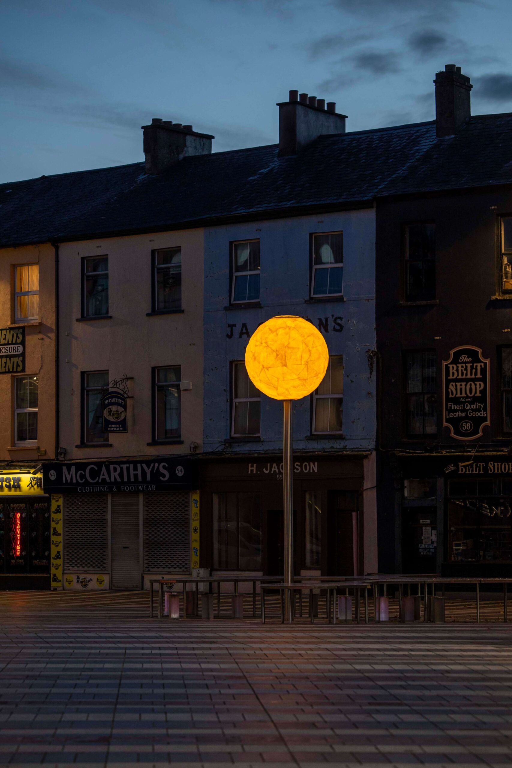 Night-time image of Urban Mirror light looking like a moon