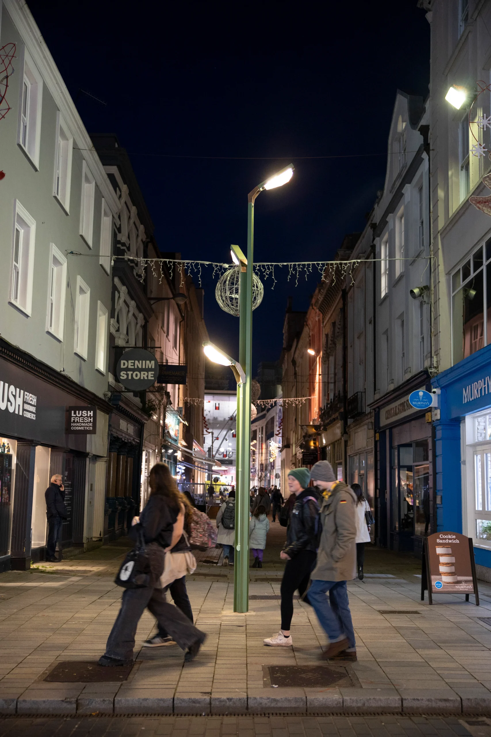 Night time image of Boom Nouveau, sculptural light, commissioned public art work for Cork City Centre.